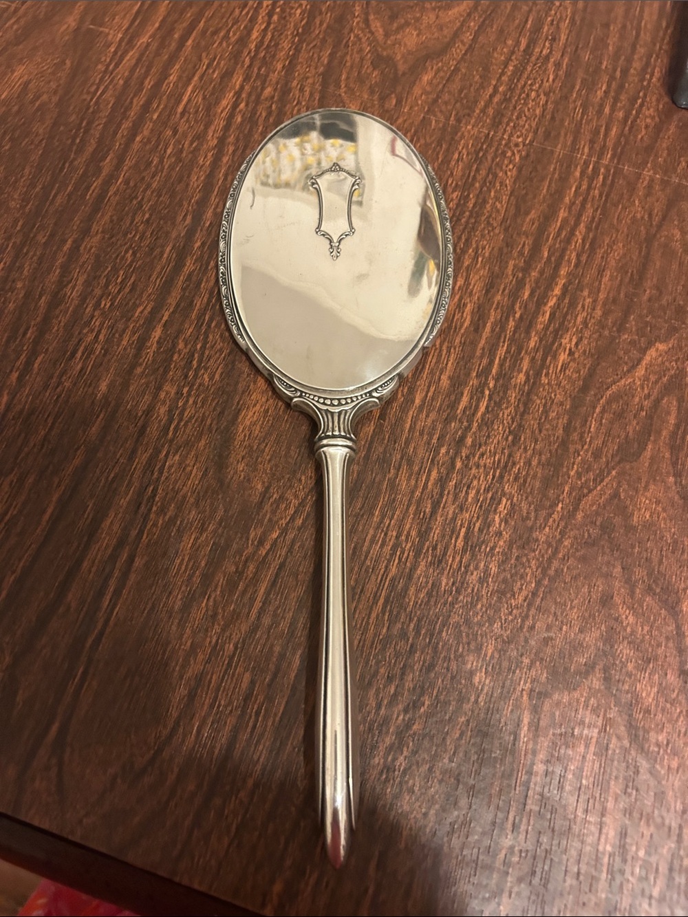 Vintage sterling hand mirror.